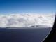 Foto von , Kategorie Wolken Linker Flügel der MD11 mit Blick auf das Triebwerk