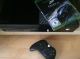 Xbox One mit Controller und dem Spiel Forza 6